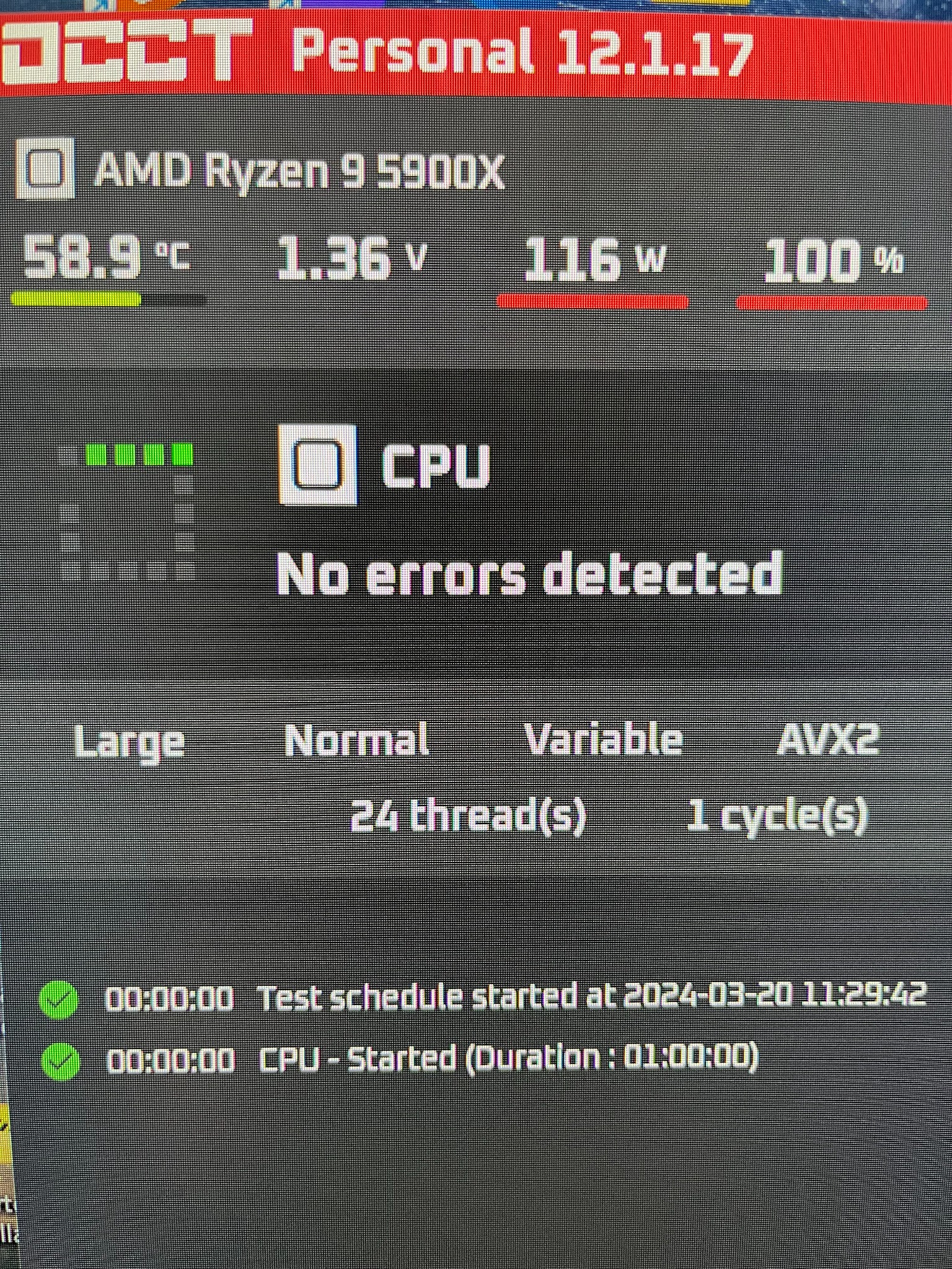 Monitor wyświetlający parametry pracy procesora AMD Ryzen 9 5900X pod obciążeniem, temperatura 58.9 stopni Celsjusza, napięcie 1.36V, pobór mocy 116W, obciążenie 100%, brak błędów.