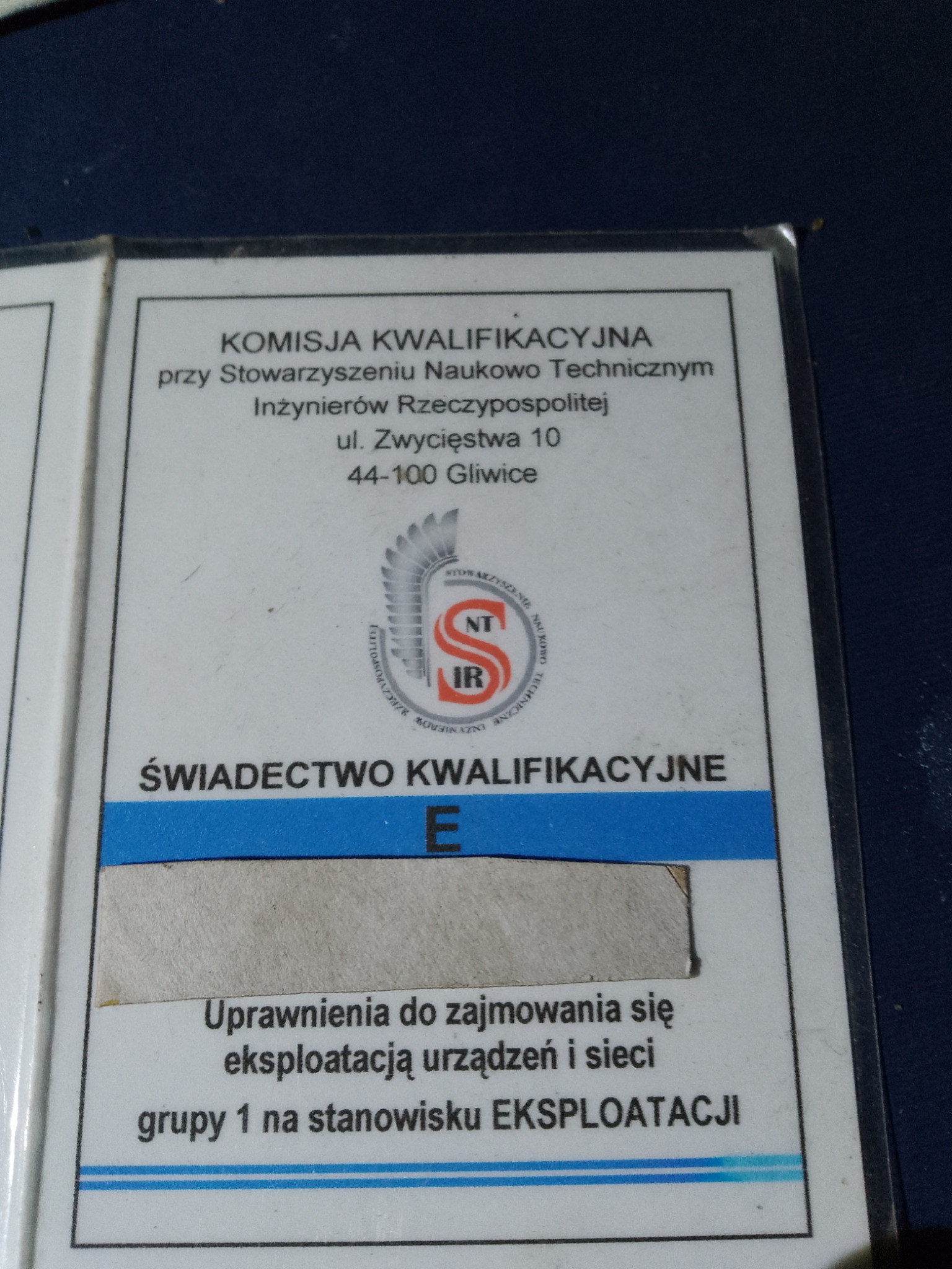 Skan Świadectwa Kwalifikacyjnego Komisji Kwalifikacyjnej przy Stowarzyszeniu Naukowo Technicznym Inżynierów Rzeczypospolitej, uprawniającego do zajmowania się eksploatacją urządzeń i sieci, grupa 1...