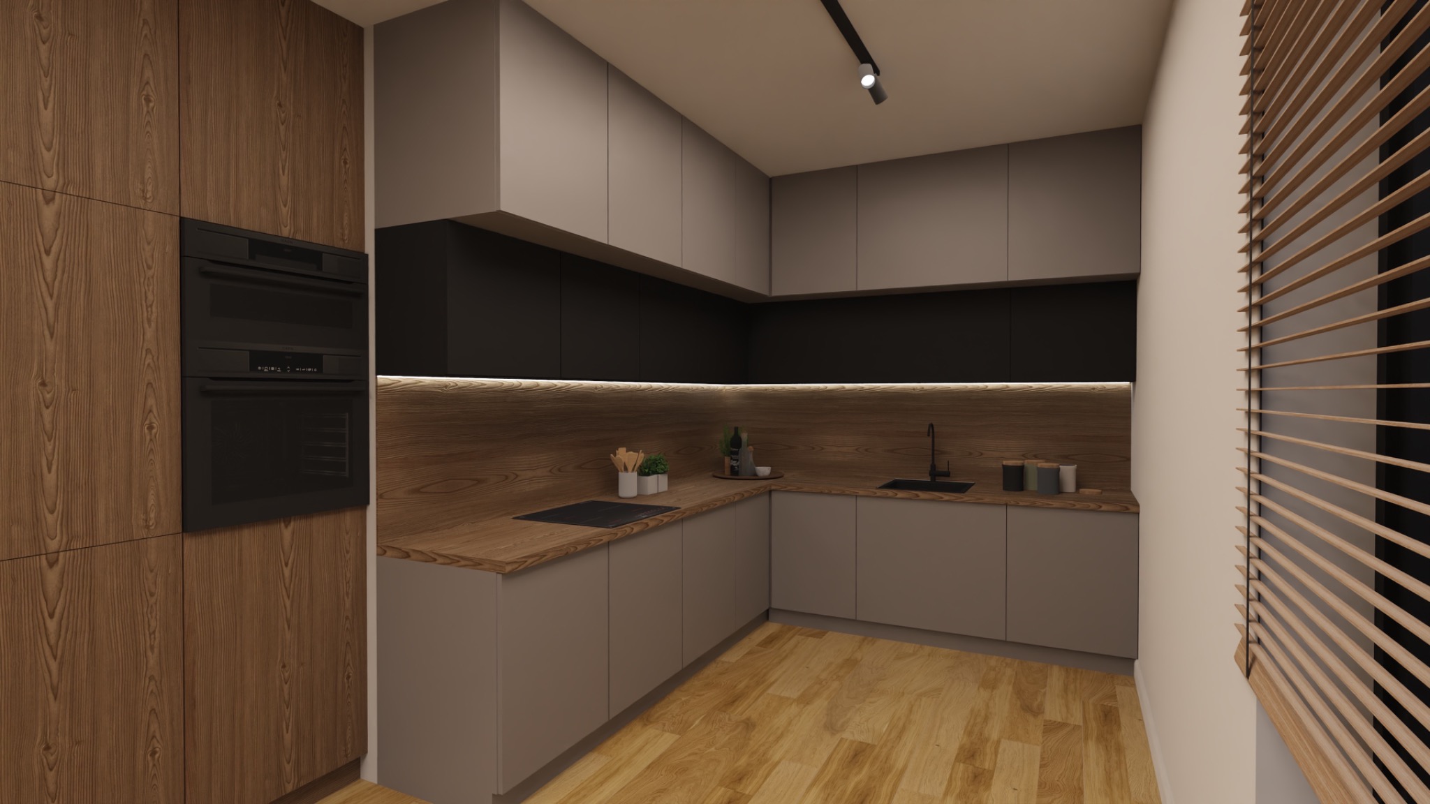 Nowoczesna kuchnia z drewnianymi akcentami: zabudowa kuchenna w odcieniach szarości, drewniany blat i panel ścienny, zabudowany piekarnik, drewniane żaluzje w oknie.