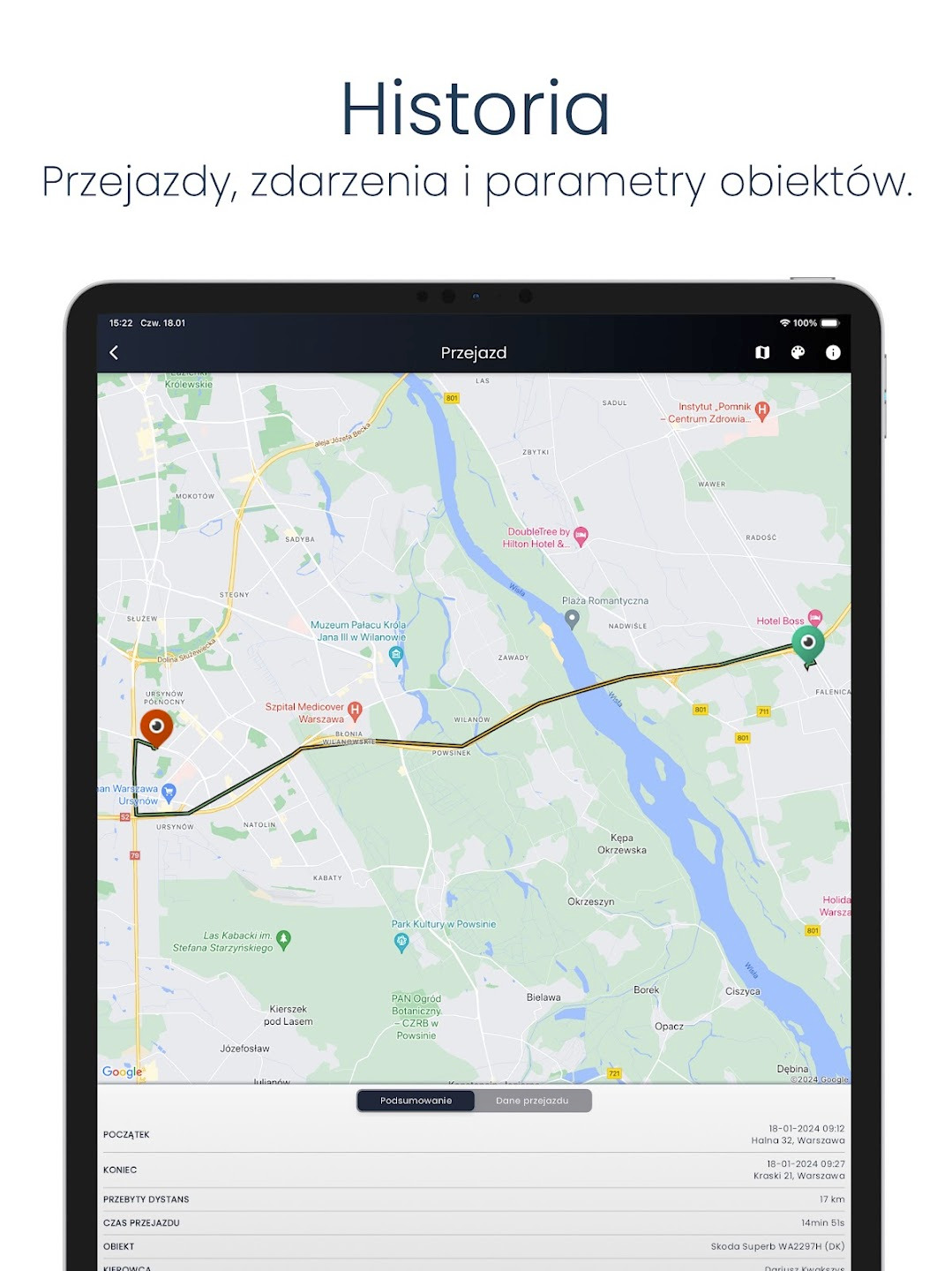 Zrzut ekranu tabletu prezentujący aplikację do monitoringu GPS pojazdów, pokazującą trasę przejazdu na mapie Warszawy z zaznaczonym punktem początkowym i końcowym.