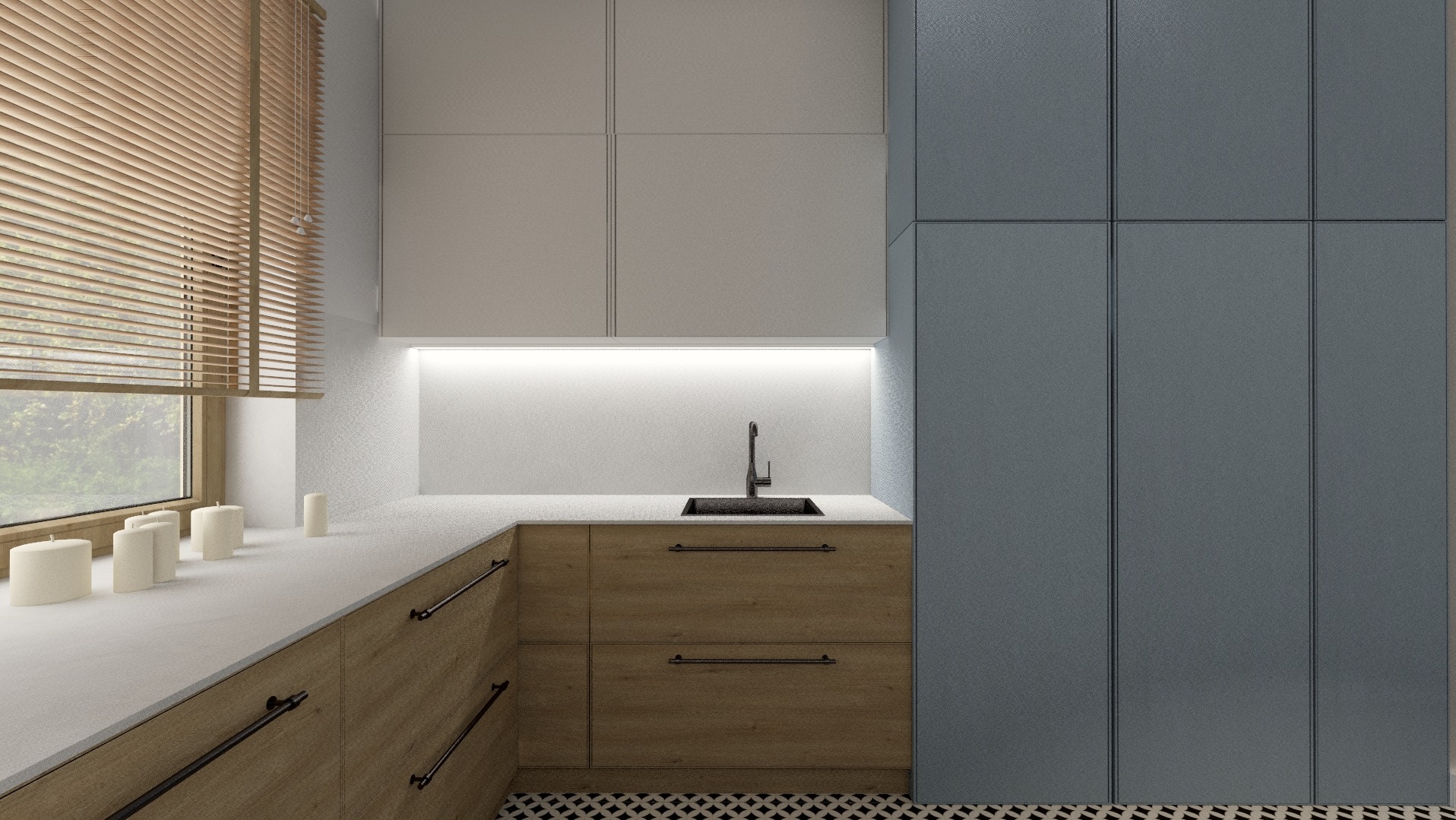 Nowoczesna kuchnia z drewnianymi szafkami, białym blatem i szarymi frontami. Okno z żaluzjami i dekoracyjne świece. Czarno-biała podłoga.