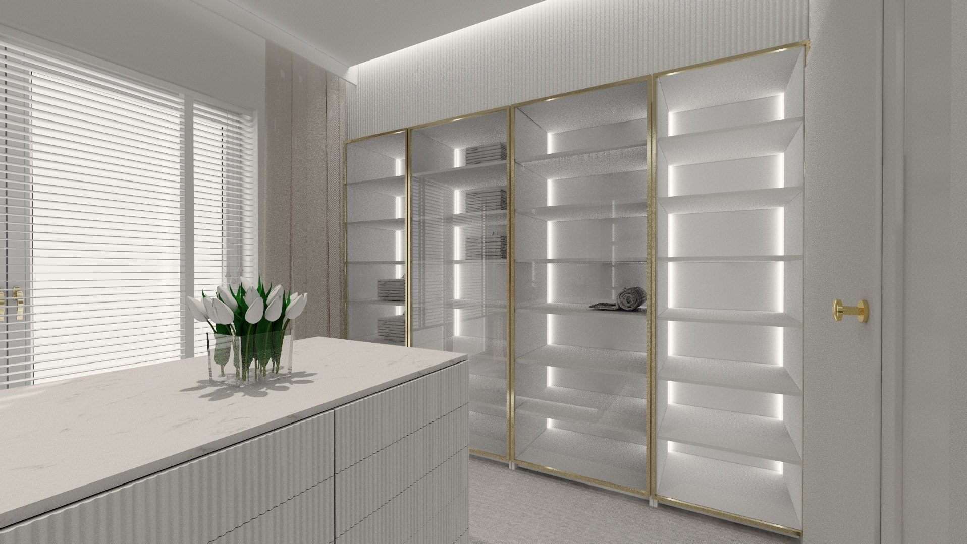 Jasne wnętrze garderoby z podświetlanymi półkami, widok na okno z żaluzjami i blat z wazonem tulipanów. Minimalistyczny design z elementami dekoracyjnymi.