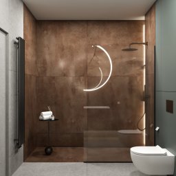 Autorska Pracownia Architektury i Wnętrz Gabriela Radwanowska - Nowoczesna łazienka z miedzianą ścianą prysznicową, podświetlanym półkolem i wiszącą toaletą, uzupełniona czarnym grzejnikiem drabinkowym i małym stolikiem z ręcznikami.