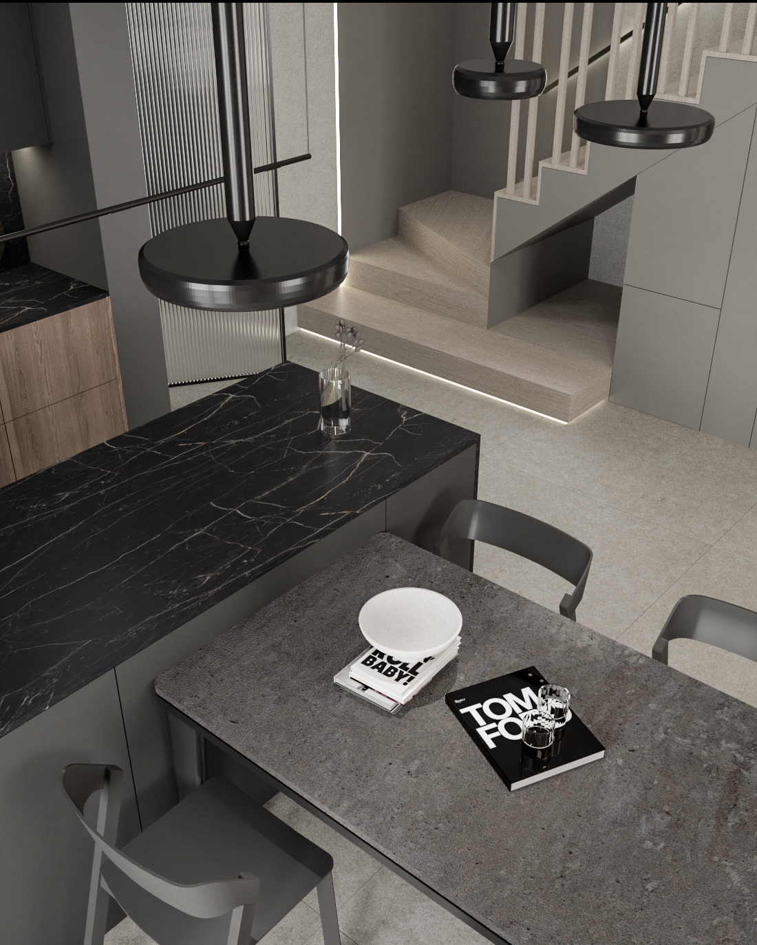 Minimalistyczna aranżacja wnętrza: czarny blat kuchenny z marmurkowym wzorem, szary stół z książkami i szklankami, nowoczesne lampy wiszące, schody z drewnianymi stopniami w tle.