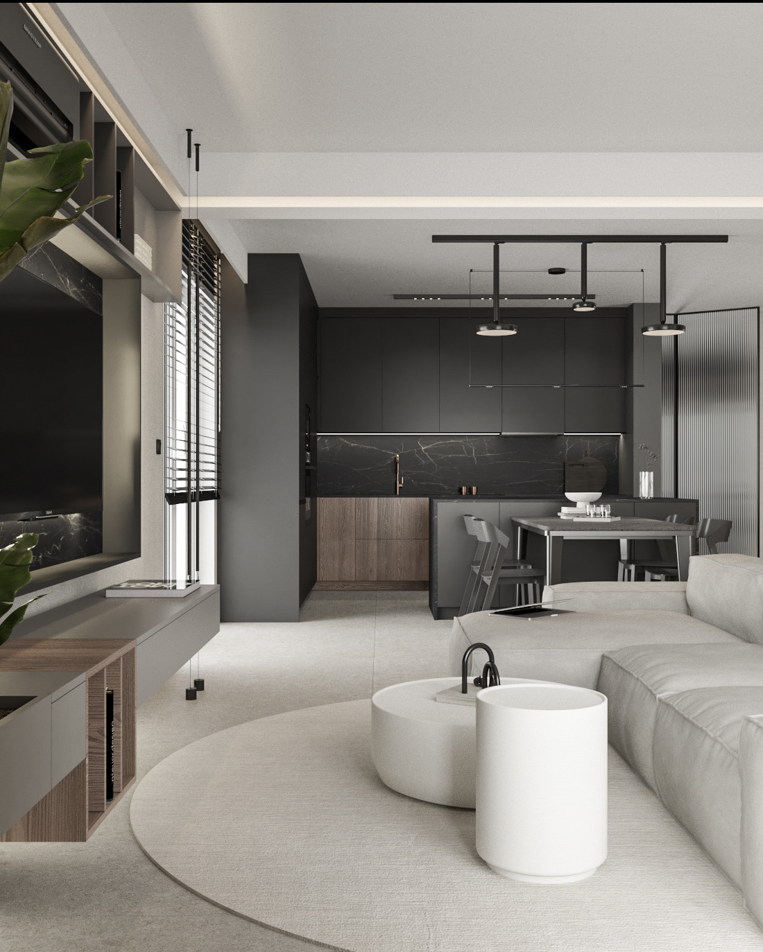 Minimalistyczne wnętrze mieszkania z otwartą kuchnią, szara kolorystyka, marmurowy backsplash, biała sofa i okrągły dywan z niskim stolikiem kawowym.
