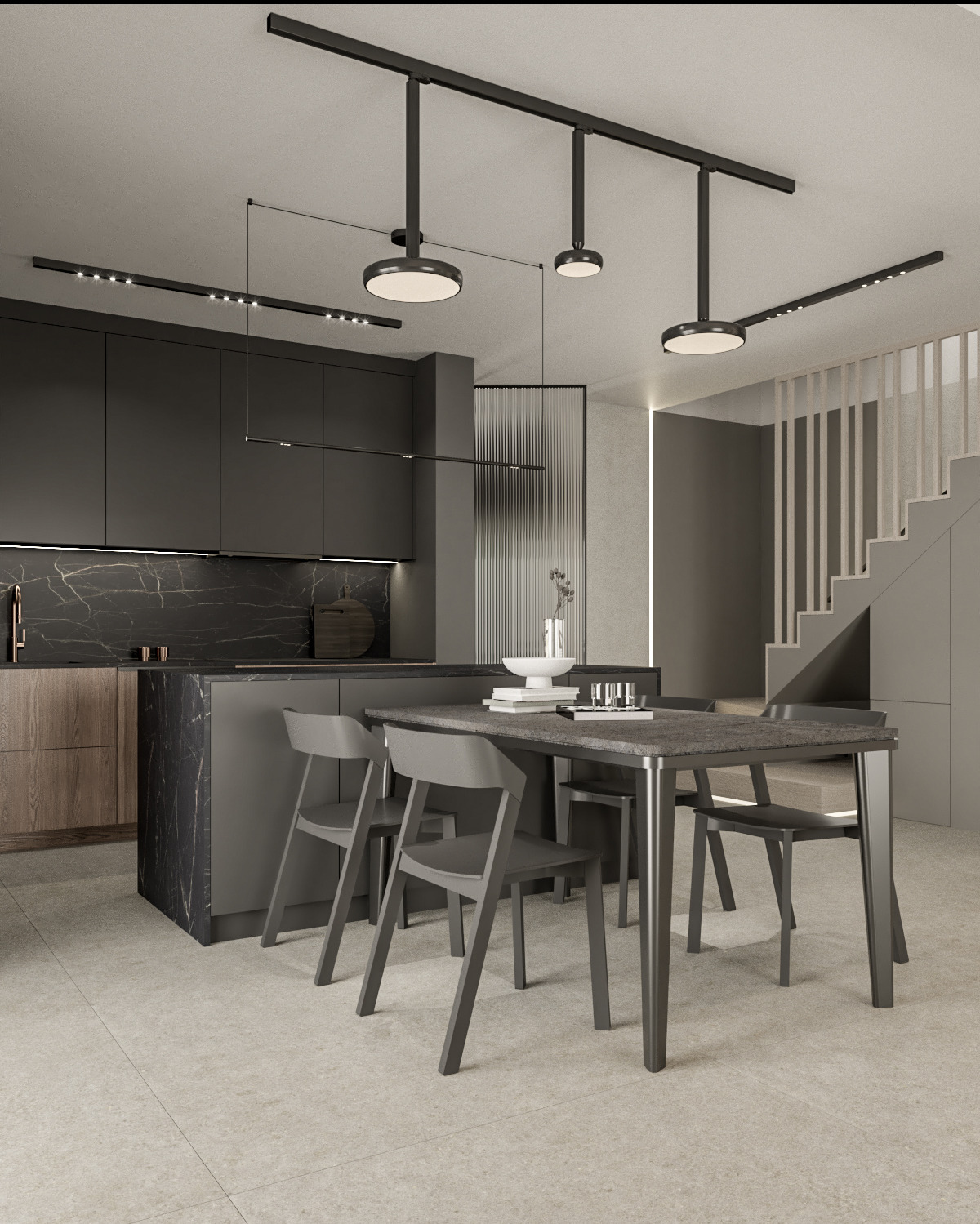 Nowoczesna kuchnia w odcieniach szarości z wyspą i stołem jadalnym, oświetlenie szynowe, marmurowy backsplash i schody w tle.