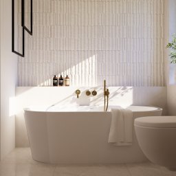 ASthetic form - Nowoczesna łazienka z wolnostojącą wanną i wiszącą toaletą. Beżowe płytki na ścianie, złota armatura, minimalistyczny design i naturalne światło.
