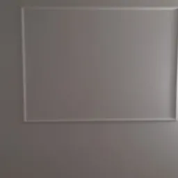 Szara ściana z dekoracyjnymi, prostokątnymi ramkami i gniazdkami elektrycznymi w trakcie montażu.