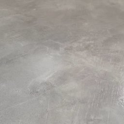 „Loft craft” imitacja surowego betonu na posadzce i ścianach. Ale bardzo miłego na dotyk