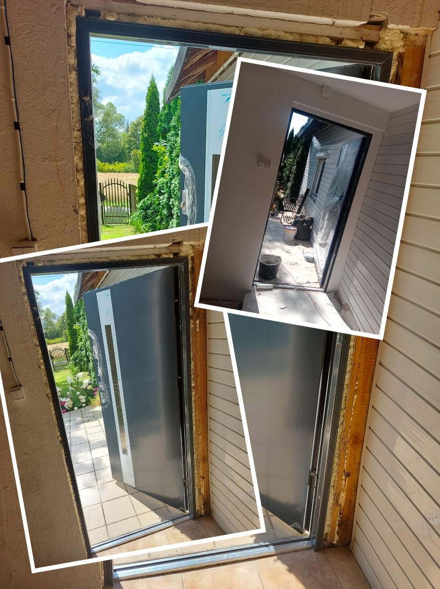 Montaż nowoczesnych, grafitowych drzwi wejściowych z widokiem na ogród, pianka montażowa wokół ościeżnicy, widoczne prace wykończeniowe.