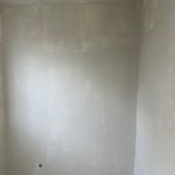Usługi ogolnobudowlane - Szpachlowanie ścian