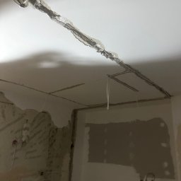 Usługi ogolnobudowlane - Instalacja elektryczna plus ściana przed tynkowaniem