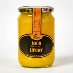 Słoik miodu nektarowego lipowego z etykietą informującą o dacie ważności i roku produkcji, widoczny znak 'Dary Pszczół'.