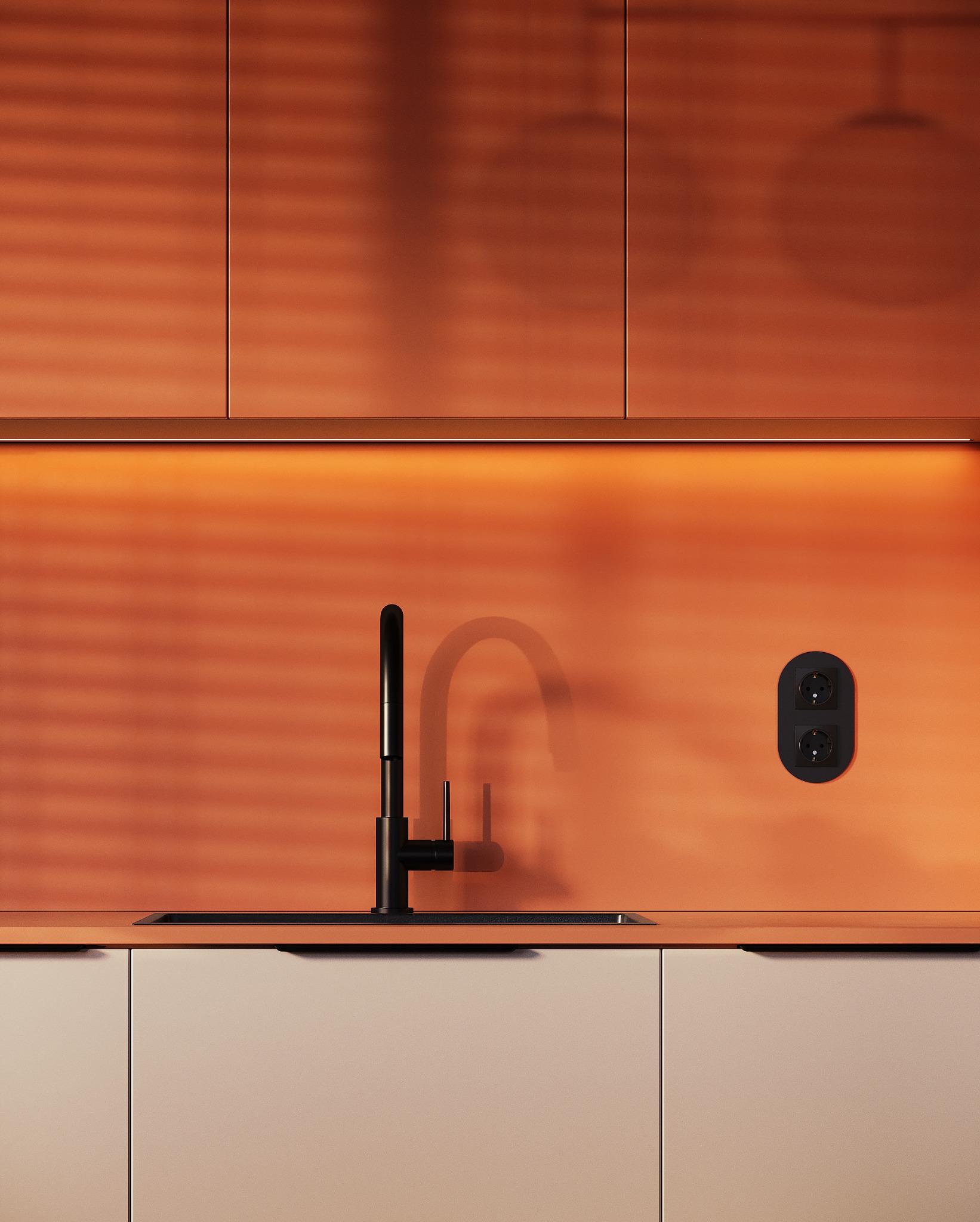 Minimalistyczna kuchnia w odcieniach pomarańczy z czarną armaturą i gniazdkami. Ciepłe oświetlenie LED podkreśla nowoczesny charakter wnętrza.