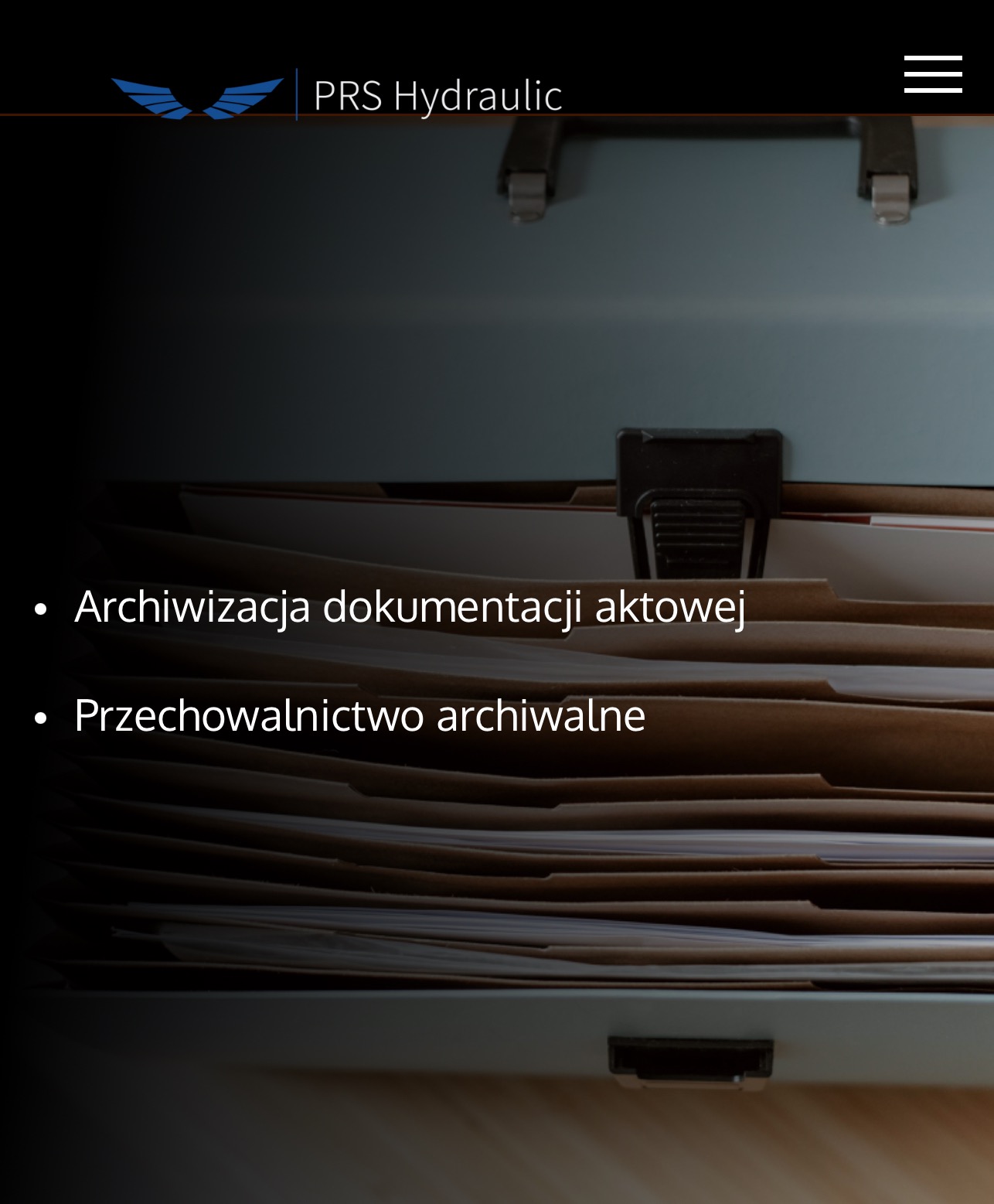 Otwarta teczka archiwizacyjna z zawartością dokumentów, widoczne zakładki i segregatory wewnątrz, na górze logo firmy PRS Hydraulic.
