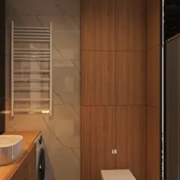 Nowoczesna łazienka z umywalką nablatową, okrągłym lustrem, grzejnikiem drabinkowym, drewnianą szafką i kabiną prysznicową w kolorze grafitu.