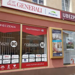 Fasada budynku z szyldami firm ubezpieczeniowych, w tym Generali i Proama, oraz informacją o multiagencji ubezpieczeniowej Multidoradcy24 z ofertą OC i AC.