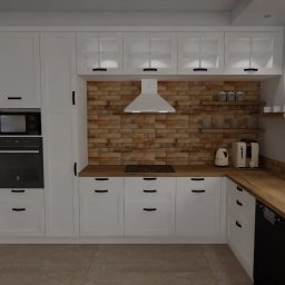 Katarzyna Zasadzińska Projekty Wnętrz - Wizualizacja nowoczesnej kuchni z białymi szafkami, czarnymi uchwytami, ceglaną ścianą nad blatem, drewnianym blatem i białym okapem.