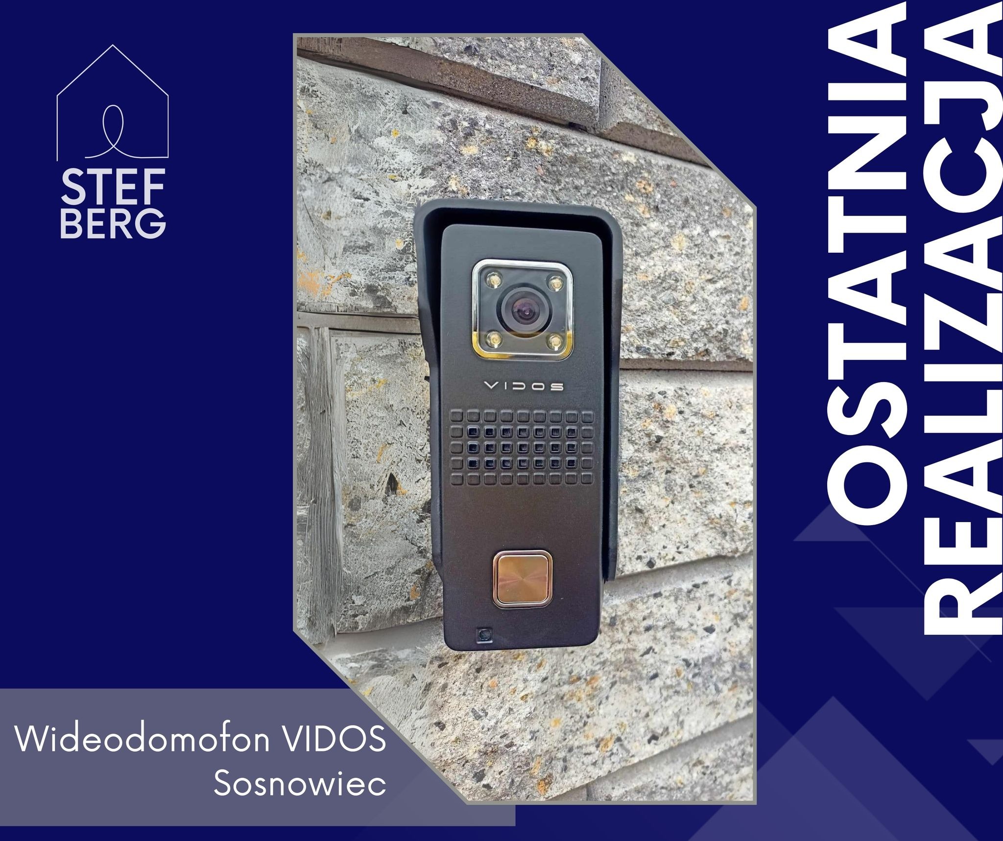 Czarny panel zewnętrzny wideodomofonu Vidos zamontowany na szarej, kamiennej elewacji.