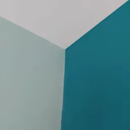 Świeżo pomalowany narożnik pokoju z trzema kolorami: biały sufit, turkusowa ściana i jasnozielona ściana.