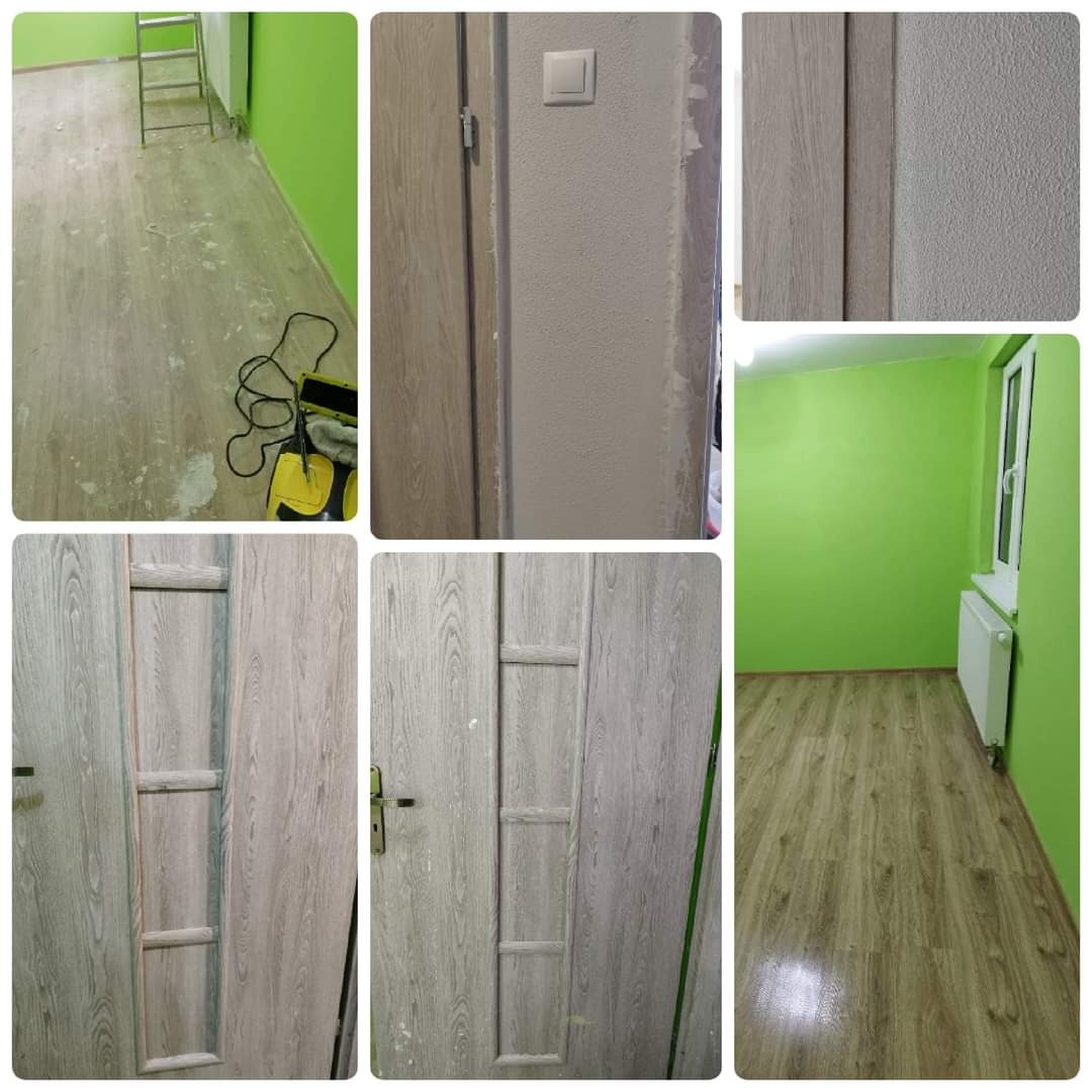 Pokój po remoncie: zielone ściany, drewnopodobna podłoga z resztkami farby, drabina, narzędzia malarskie, odświeżone drzwi z drewnianym wzorem.