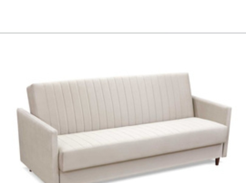 Rozkładana sofa w jasnym odcieniu beżu z pionowymi przeszyciami na oparciu, prezentowana na białym tle.