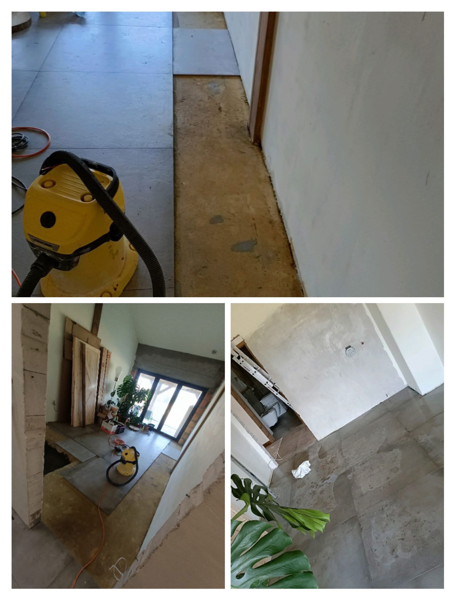 Wnętrze remontowanego mieszkania z częściowo położoną szarą podłogą, żółtym odkurzaczem przemysłowym Karcher i surowymi ścianami przygotowanymi do malowania.