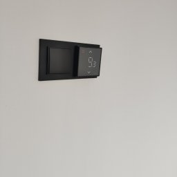 E-LEKTRYK Damian Chojnacki - Termostat w ramce z wyłącznikiem oświetlenia.