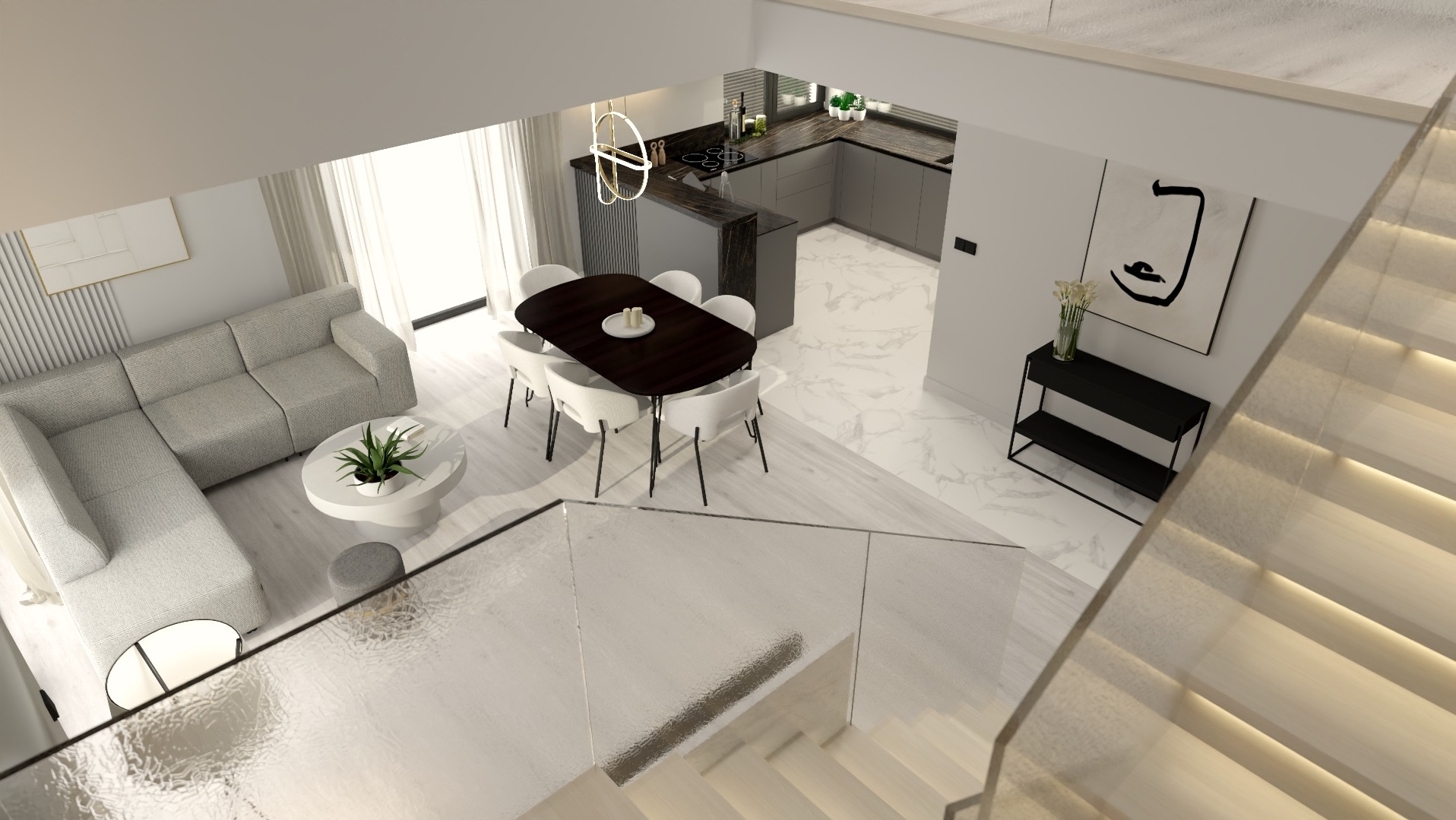 Widok z góry na nowoczesny salon z narożną sofą, okrągłym stolikiem kawowym z rośliną, jadalnią z ciemnym stołem i białymi krzesłami, oraz kuchnią z szarymi szafkami, oświetlony naturalnym światłem...