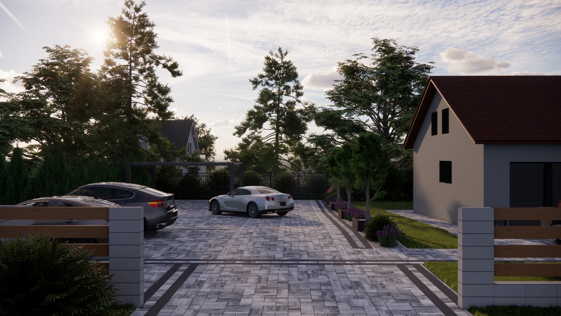 Nowoczesny podjazd z szarej kostki brukowej, obramowany niskimi rabatami z lawendą, z dwoma samochodami na tle domu i drzew