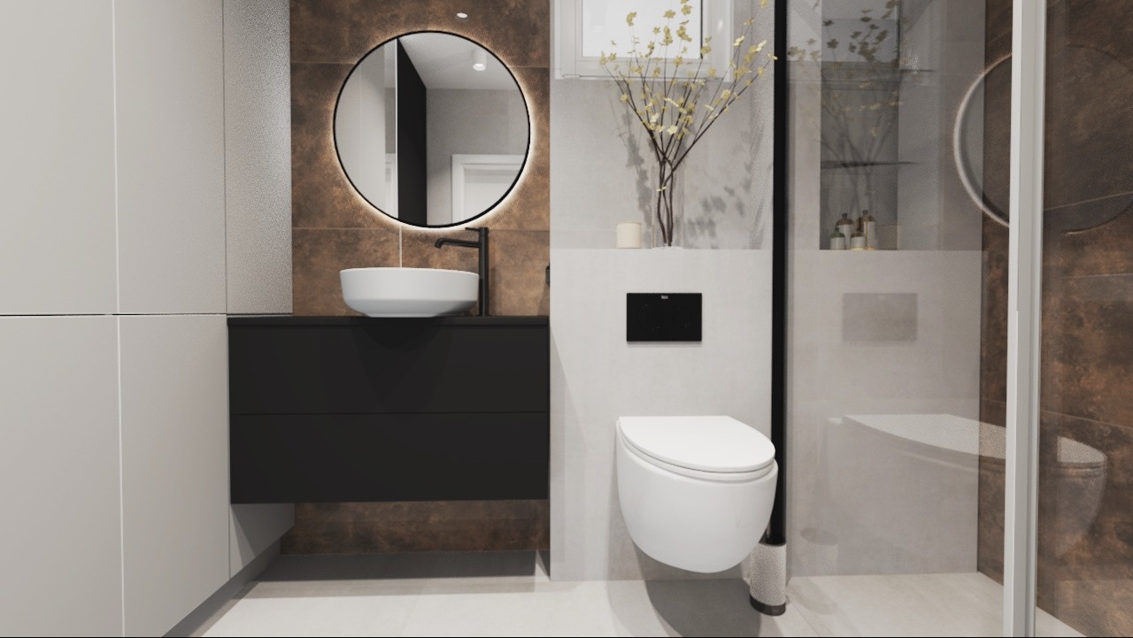 Nowoczesna łazienka z okrągłym lustrem podświetlanym LED, wiszącą miską WC i umywalką nablatową na czarnej szafce, całość w stonowanej kolorystyce z akcentami brązu.