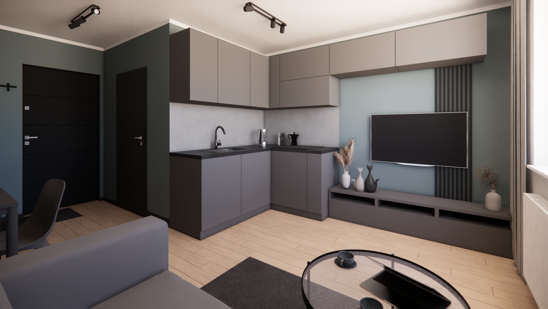 Wizualizacja wnętrza mieszkania z otwartą kuchnią, szare meble kuchenne, czarny zlew i bateria, drewniana podłoga, telewizor na ścianie, szara sofa i stolik kawowy.