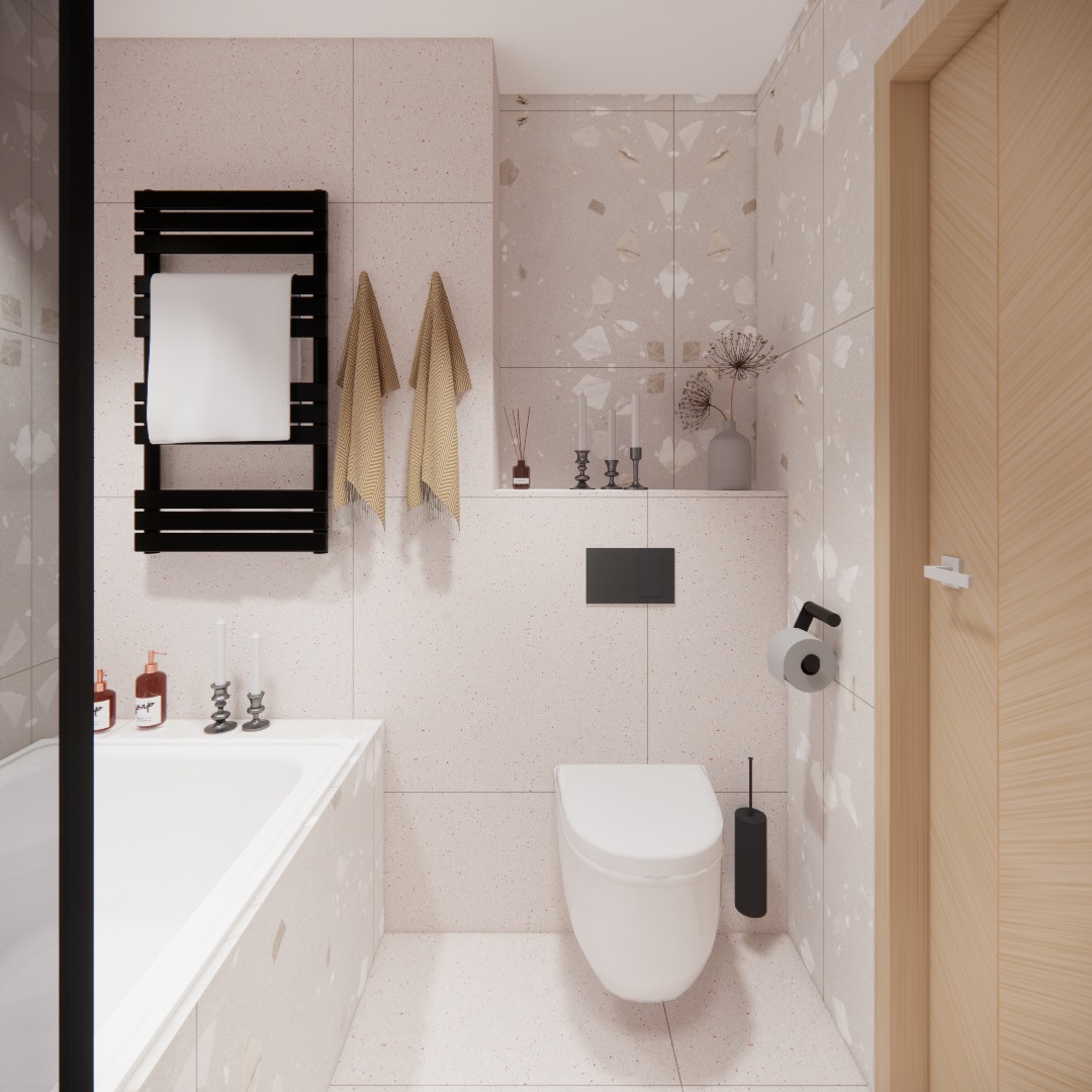 Nowoczesna łazienka z płytkami lastryko, wiszącą toaletą, czarnym grzejnikiem drabinkowym z białym ręcznikiem, drewnianymi drzwiami i dekoracjami na półce.