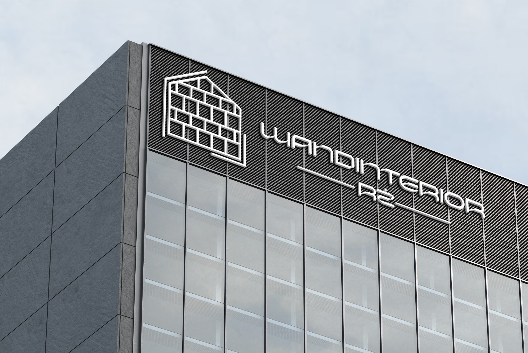 Elewacja budynku biurowego z logo firmy WANDINTERIOR R2, prezentująca motyw domu z cegieł w minimalistycznym stylu.