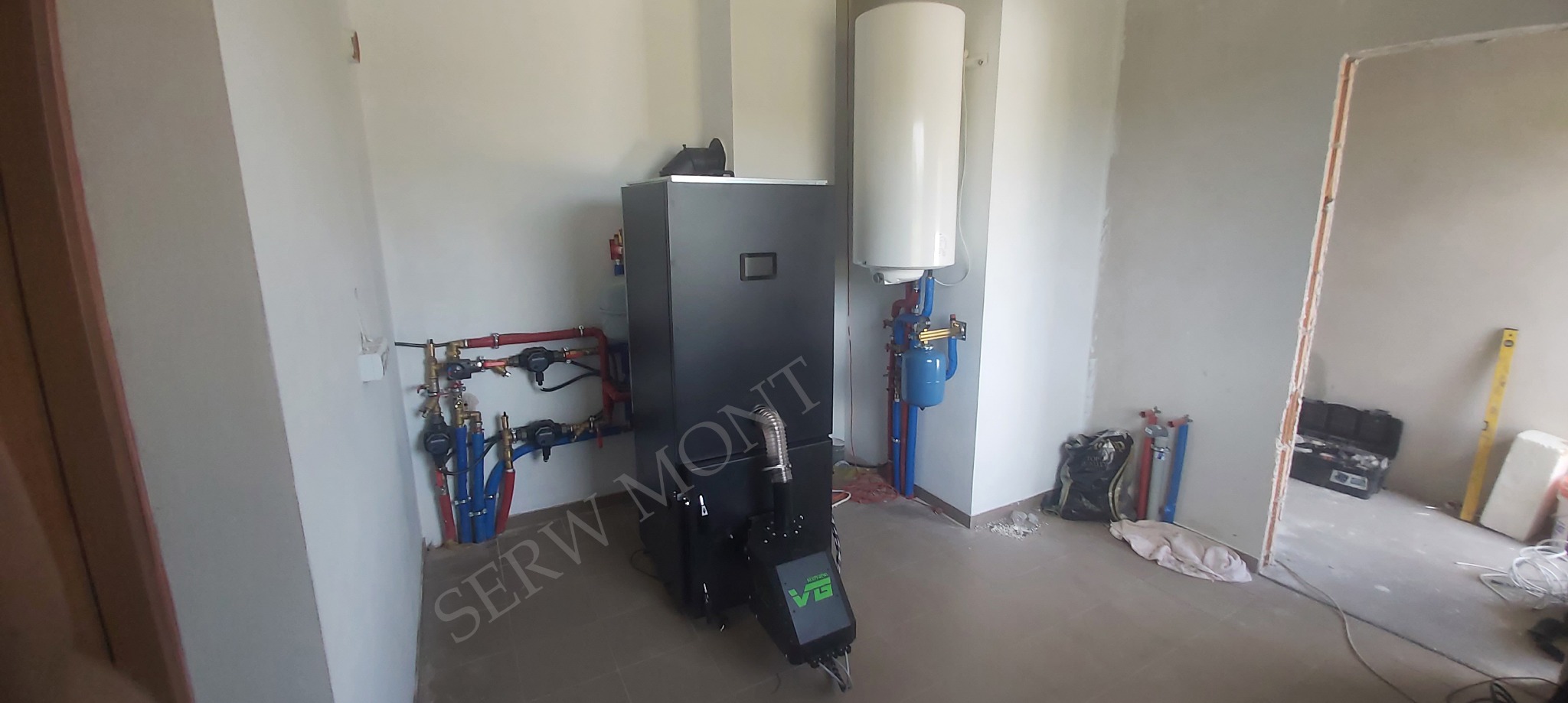 Montaż wraz z pierwszym uruchomieniem Kocioł Kostrzewa EEI 12kW