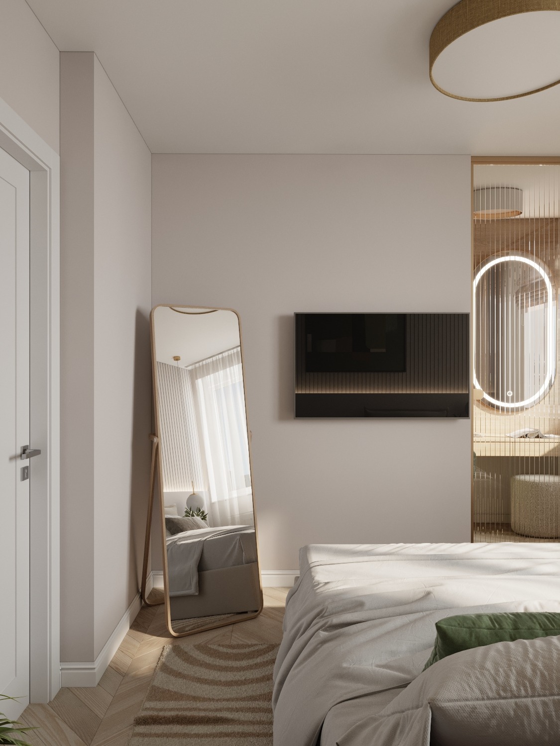 Nowoczesna sypialnia w neutralnych barwach z dużym lustrem stojącym, podświetlaną toaletką i wiszącym telewizorem.