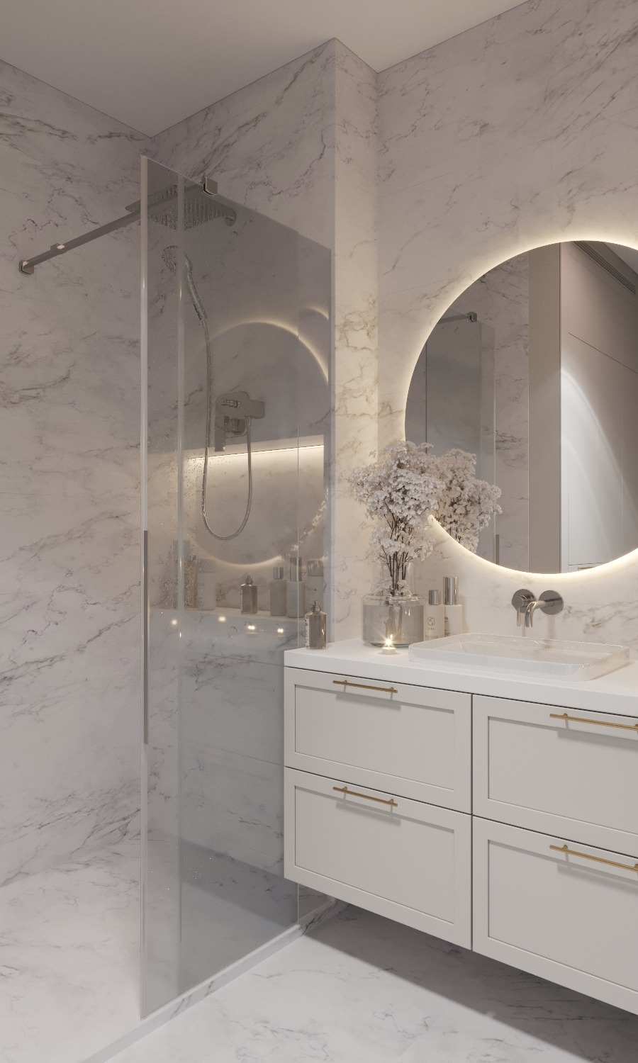Nowoczesna łazienka z kabiną prysznicową typu walk-in, umywalką nablatową i podświetlanym lustrem w okrągłej ramie, wykończona białym marmurem.