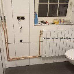 Przeróbka, przestawienie nowego grzejnika i wykonanie zasilania i odpływu pod pralkę