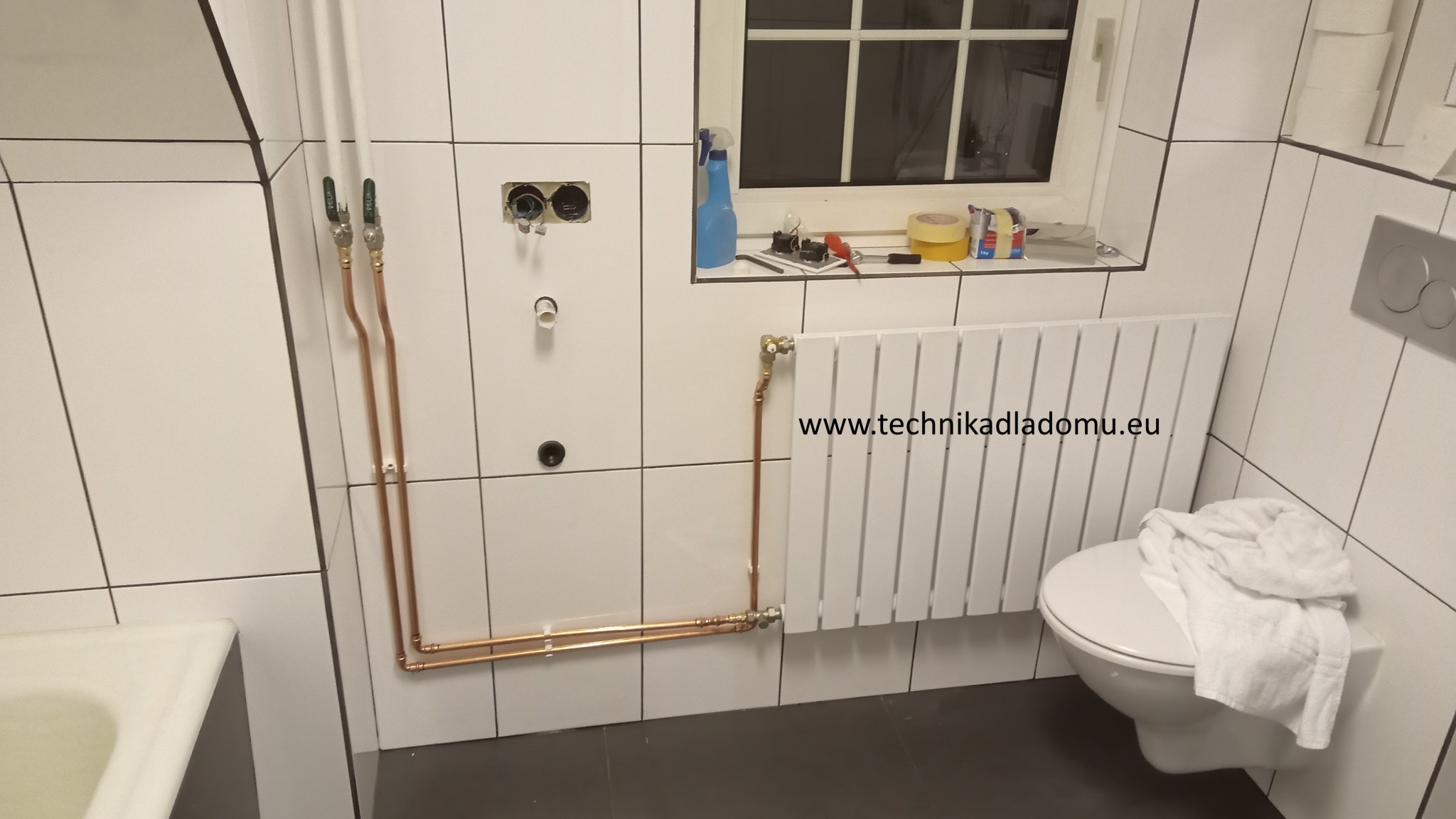 Przeróbka, przestawienie nowego grzejnika i wykonanie zasilania i odpływu pod pralkę
