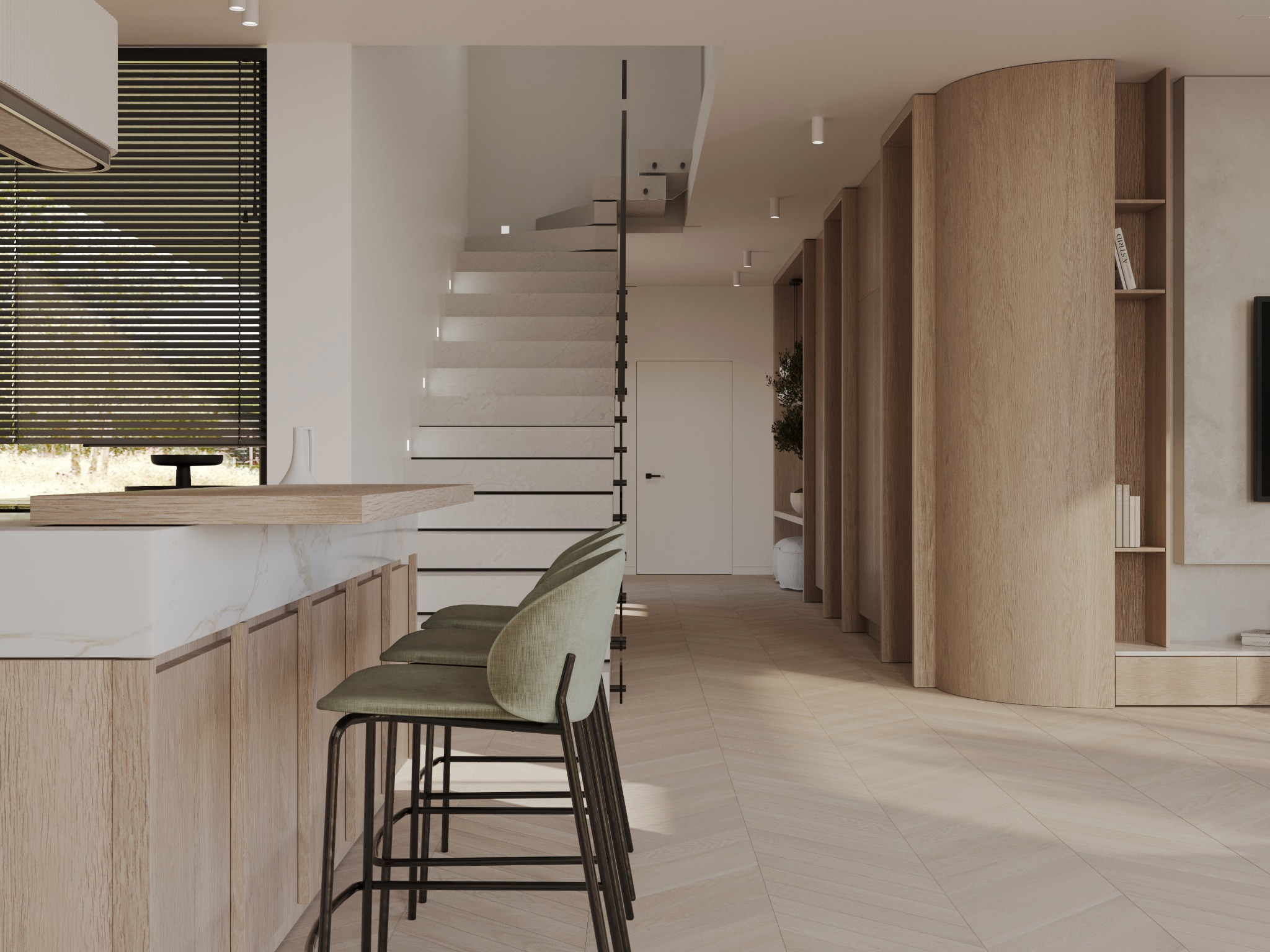 Nowoczesne wnętrze domu z otwartą kuchnią, marmurowym blatem, drewnianymi szafkami, wysokimi krzesłami barowymi z zielonym obiciem, schodami z przeszkloną balustradą oraz dekoracyjną ścianką...