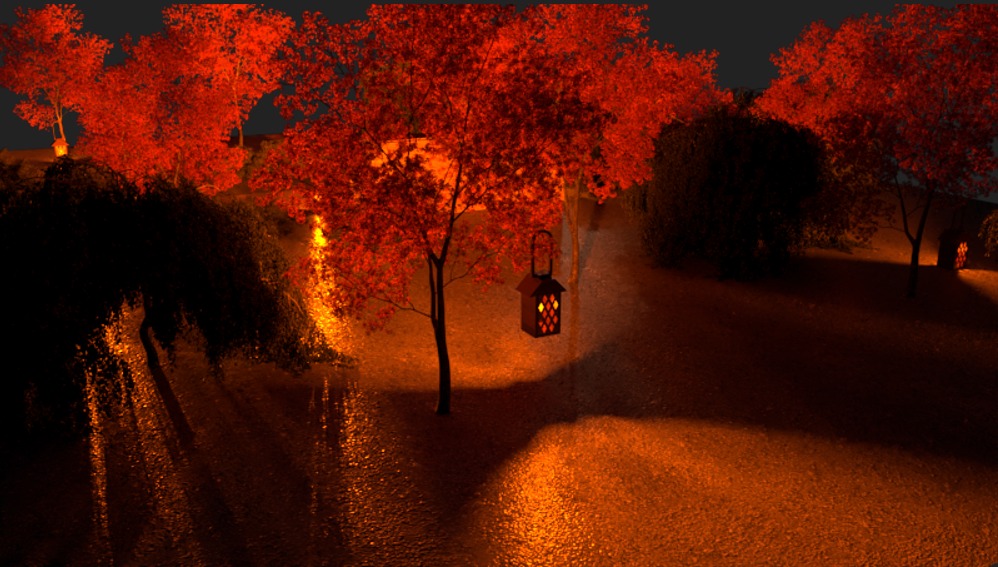 Oświetlony lampion wiszący na drzewie z czerwonymi liśćmi w ogrodzie nocą, ścieżka oświetlona ciepłym światłem, krzewy i drzewa w tle.