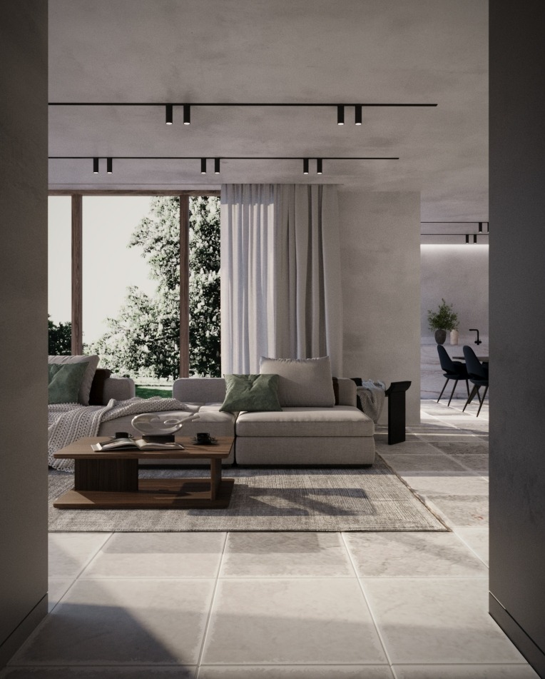 Jasny salon z szarą sofą narożną i drewnianym stolikiem kawowym. Naturalne światło z okna, minimalistyczne oświetlenie sufitowe, kamienna podłoga, neutralna kolorystyka.