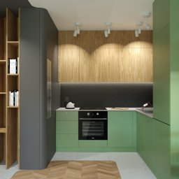 JAS Studio - Wizualizacja kuchni w odcieniach zieleni z drewnianymi akcentami, czarnym backsplashiem i parkietem w jodełkę. Widoczne oświetlenie punktowe i półka z książkami.