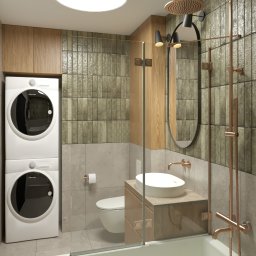 JAS Studio - Wizualizacja łazienki z pralką i suszarką w zabudowie, umywalką nablatową, kabiną prysznicową i baterią w kolorze miedzi. Nad umywalką lustro w czarnej ramie.