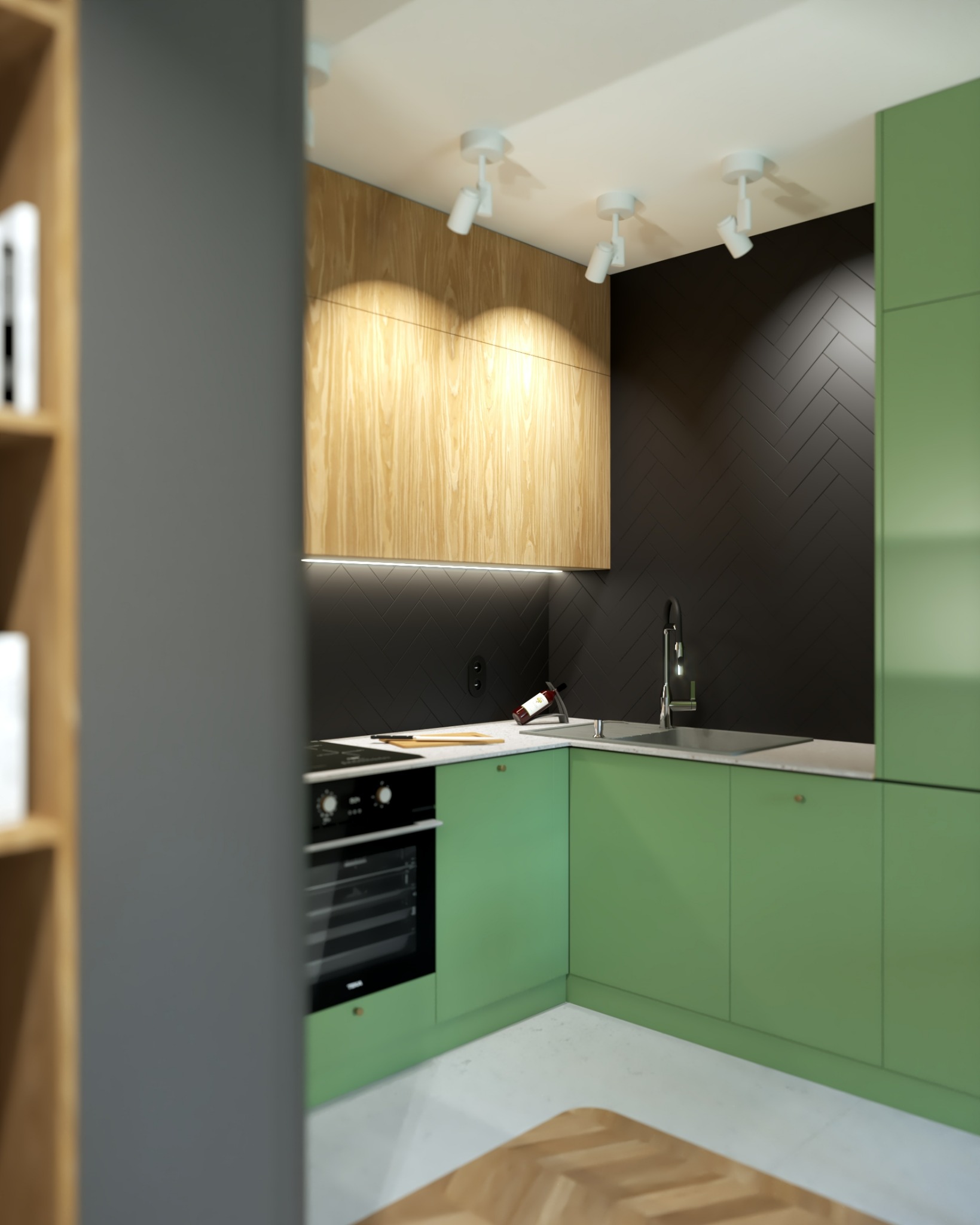 Nowoczesna kuchnia z zielonymi szafkami, drewnianymi akcentami i czarną ścianą w jodełkę. Oświetlenie punktowe i butelka wina dodają charakteru.