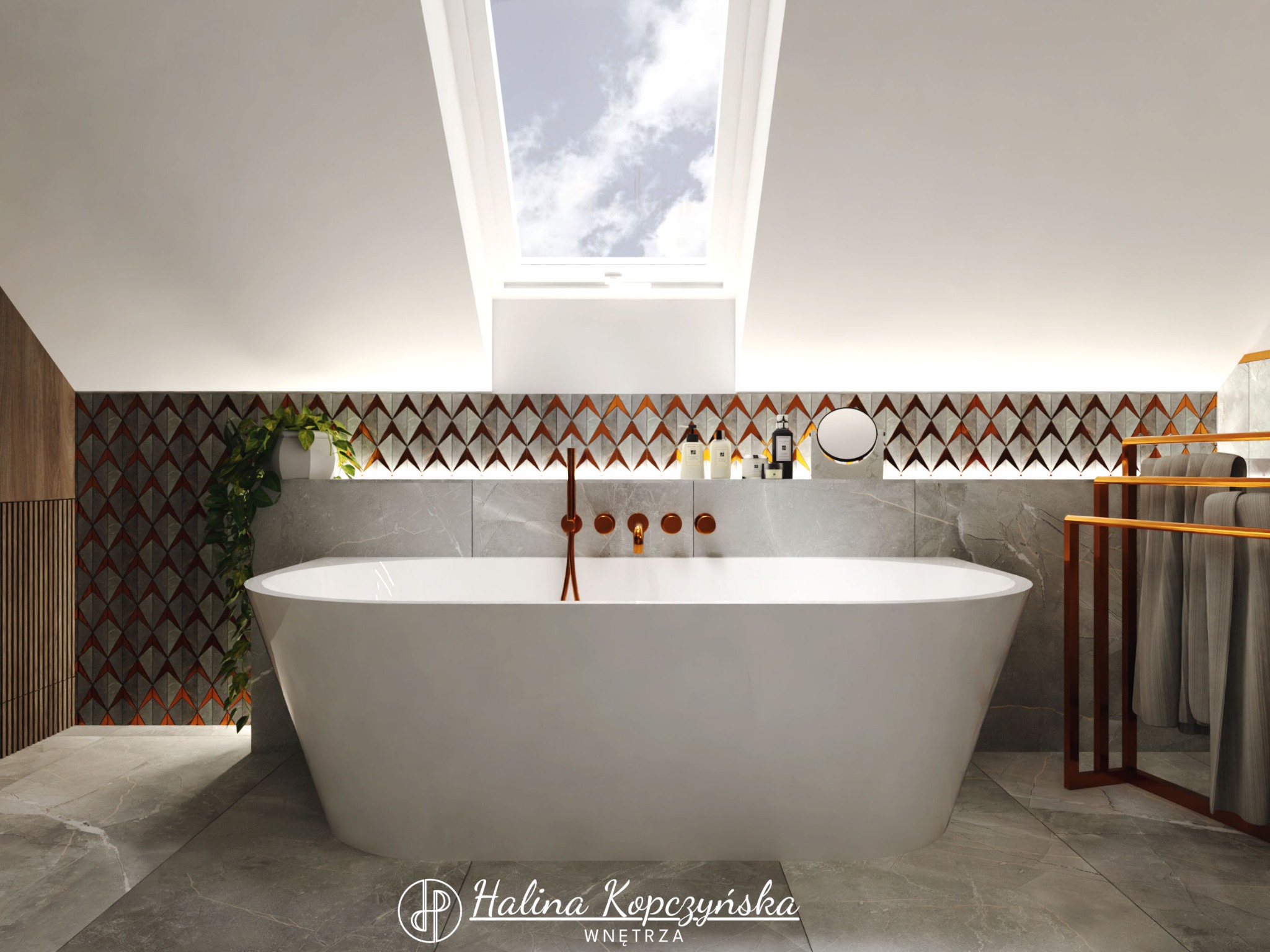 Nowoczesna łazienka z wolnostojącą wanną pod oknem dachowym, geometryczna mozaika na ścianie, armatura w kolorze miedzi i szary marmur na podłodze.