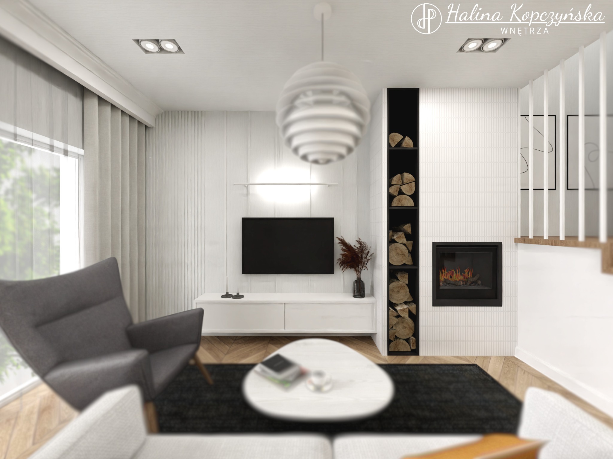 Wizualizacja salonu z kominkiem, drewnem ułożonym obok, szarym fotelem i okrągłym stolikiem kawowym na czarnym dywanie.