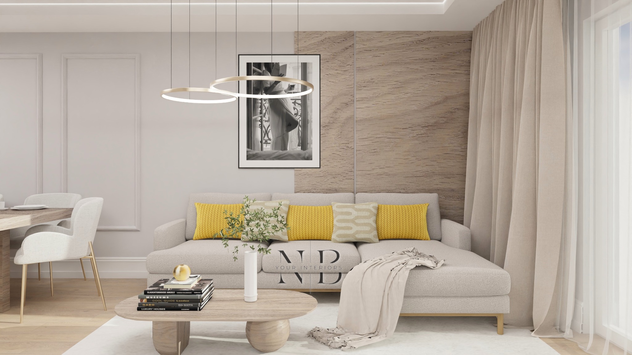 Jasne wnętrze salonu z beżową sofą, żółtymi poduszkami, okrągłym stolikiem kawowym z książkami i wazonem, wiszącą lampą pierścieniową oraz obrazem w czarnej ramie na tle ściany z fakturą drewna.
