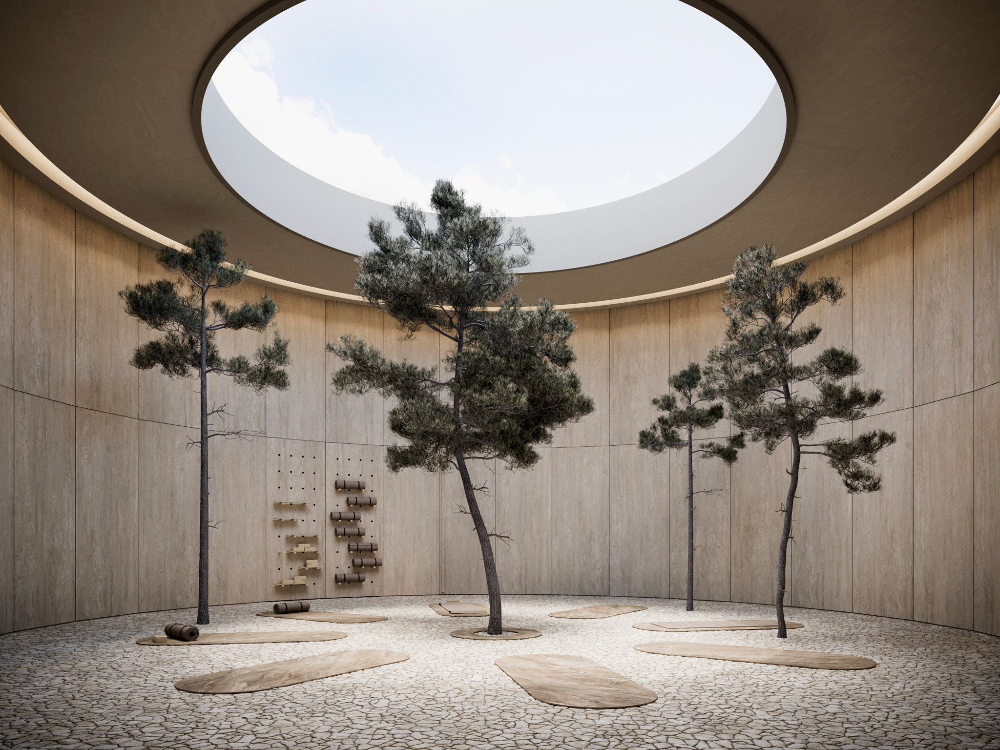 Minimalistyczne wnętrze z kamienną podłogą, okrągłym świetlikiem w suficie, trzema drzewami Bonsai i rozłożonymi matami do ćwiczeń, tworzące spokojną przestrzeń do medytacji lub ćwiczeń jogi.