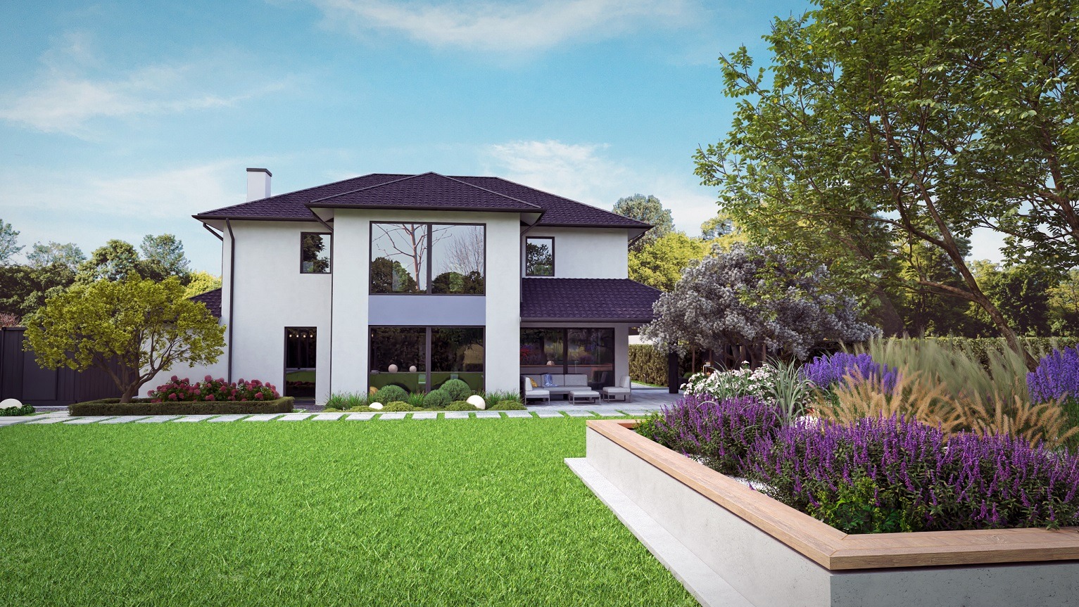 Dwupiętrowy dom z płaskim dachem i dużymi oknami, otoczony zadbanym trawnikiem i rabatami z kwitnącymi lawendami oraz ozdobnymi trawami.